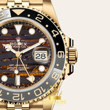 Rolex GMT-MASTER II Doré/Tiger Iron 40mm
